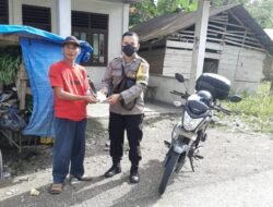 Bhabinkamtibmas Polsek Bawolato, Tegakkan Disiplin Prokes Dengan Membagikan Masker Gratis