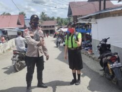 Tetap Patuhi Protokol Kesehatan, Bhabinkamtibmas Polsek Mandrehe Lakukan Patroli Jam Pulang Sekolah