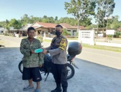 Antisipasi Covid 19, Bhabinkamtibmas Polsek Bawolato bagikan Masker Gratis