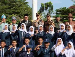 Kapolres Ogan Ilir Dampingi Bupati dan Ikuti Upacara Peringatan Hardiknas 2023