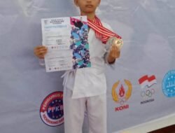 NAROTAMA PUTRA RULLYANATA RAIH 2 MEDALI DI KEJUARAAN TATAMI KICKBOXING CHAMPIONSHIP DI SURABAYA